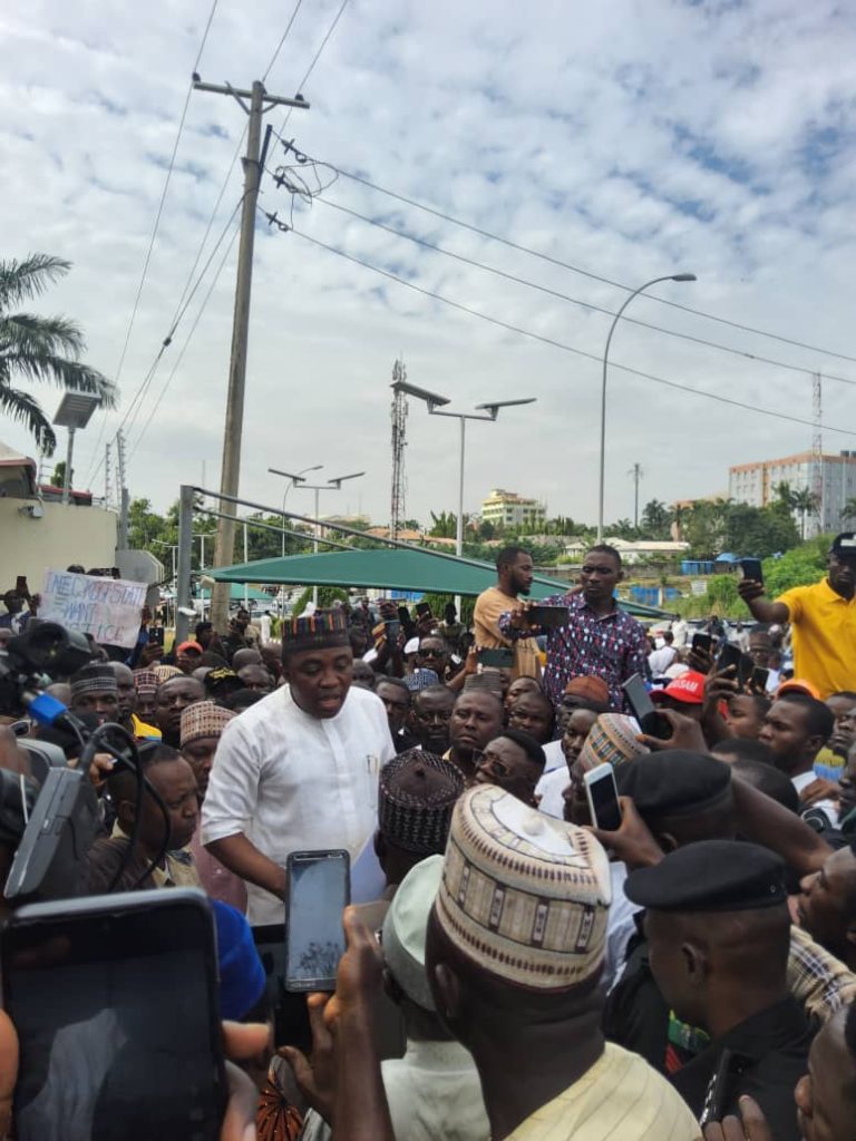 SDP Candidate, Muritala Ajaka, Protests Outcome of Kogi Governorship Election at INEC Headquarters